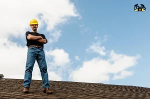 Anaheim roofer standing on a roof while demonstrating qualities of a reliable roofing contractor.