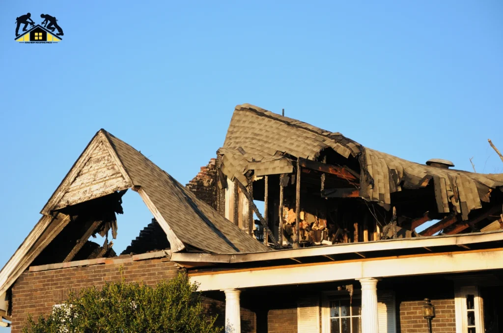 Anaheim roofers repairing severe roof damage on a home after a storm.